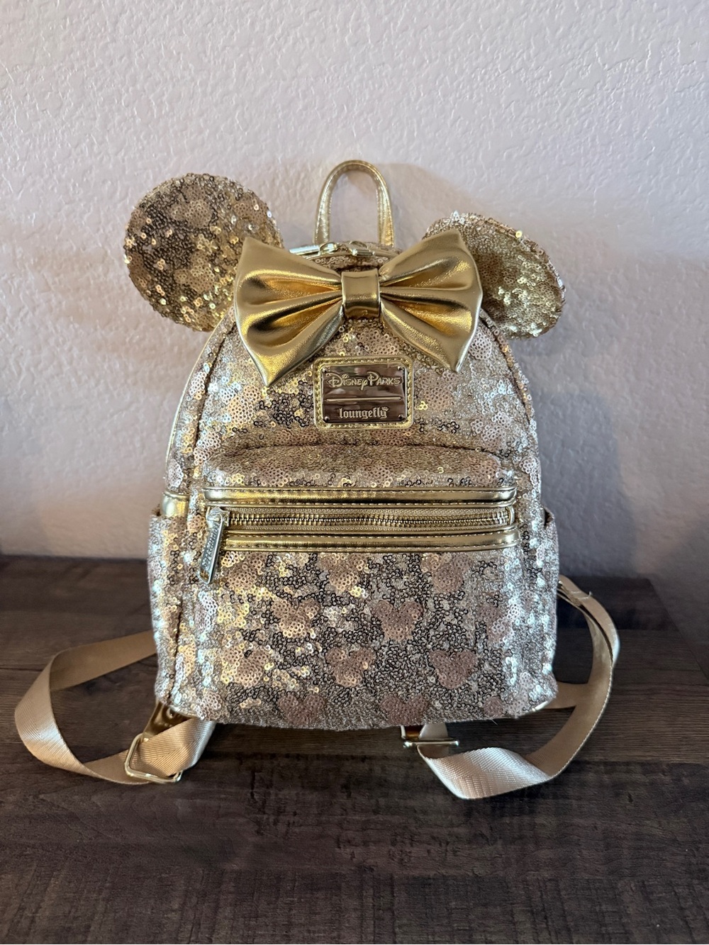 Loungefly Disney gold sequin backpack with hidden mickeys